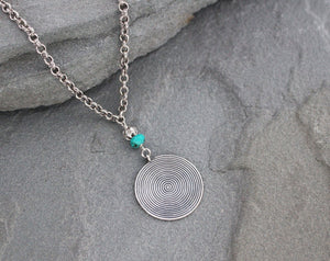 Turquoise and Thai Hill Tribe silver pendant necklace on chain.